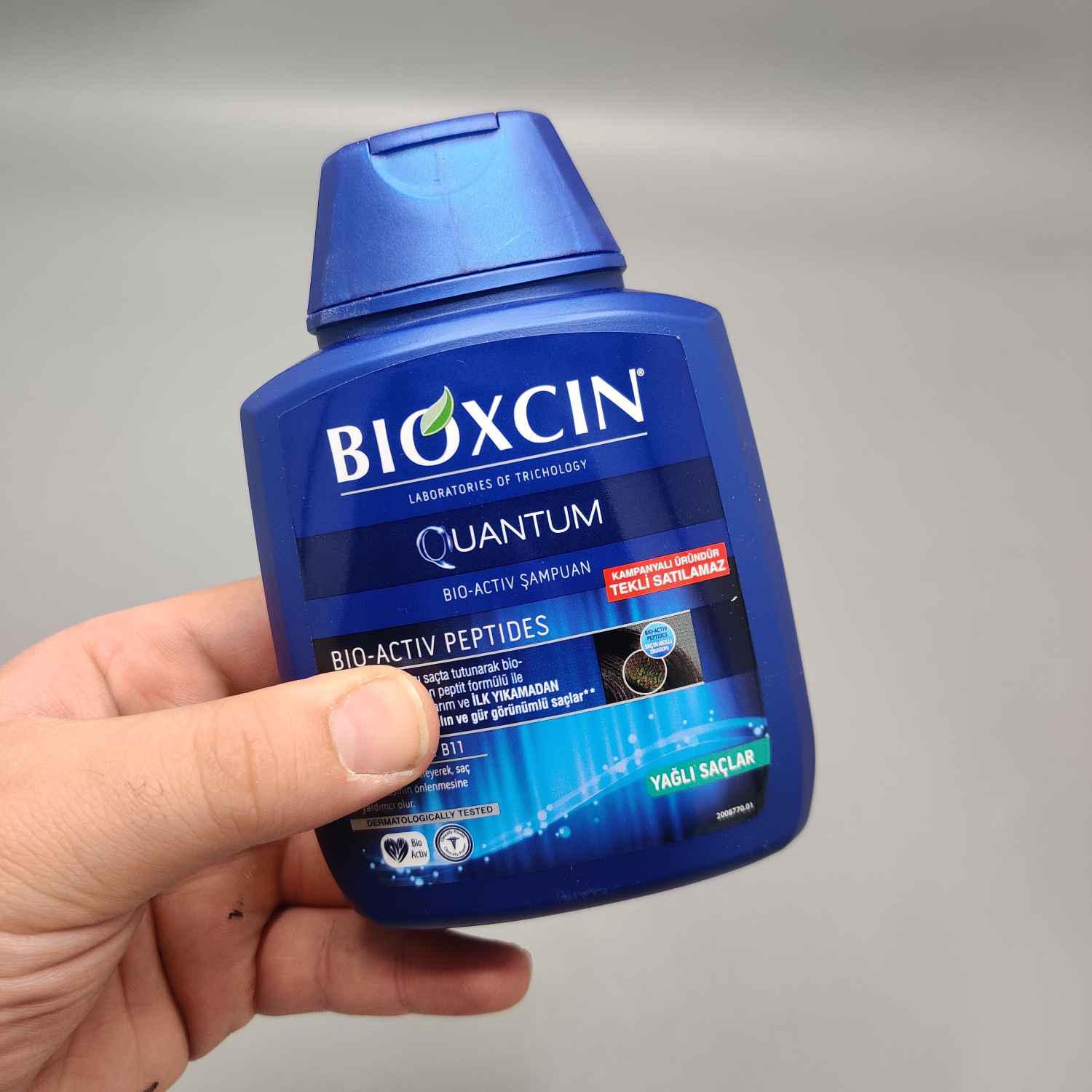 شامپو ضد ریزش مو بیوکسین مدل کوانتوم آبی